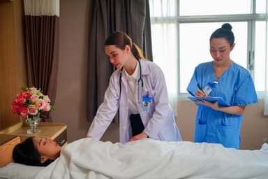 Phlebotomy student practicing blood draw technique in clinic lab